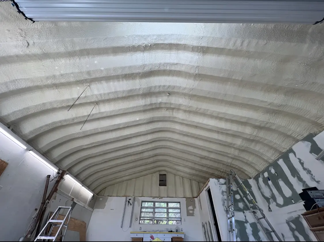 Spray polyurethane foam applied to the underside of a metal roof deck in Chaparral